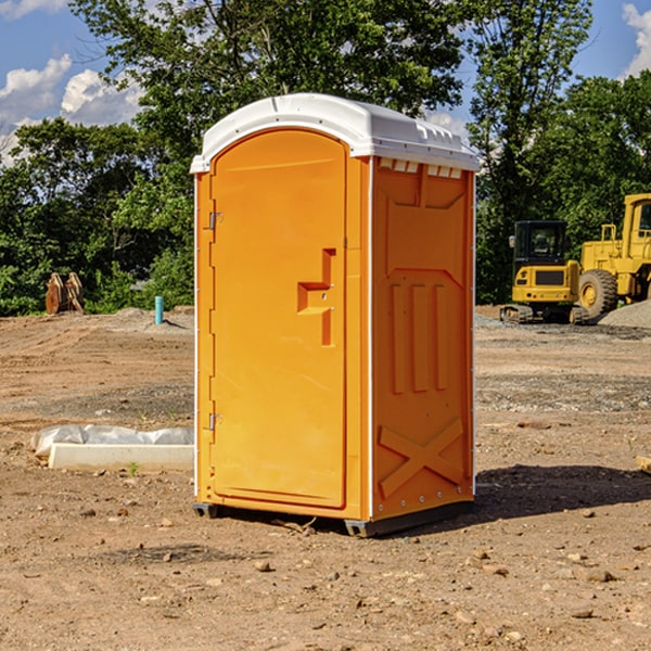 what is the cost difference between standard and deluxe portable restroom rentals in Castana